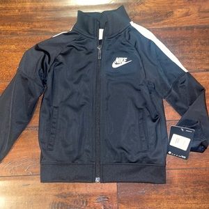 New Nike tracksuit size 5